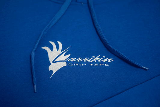 Larrikin Griptape Signature Hoodie, Royal Blue, White Embroidery of signature logo. Close up of white embroidered logo